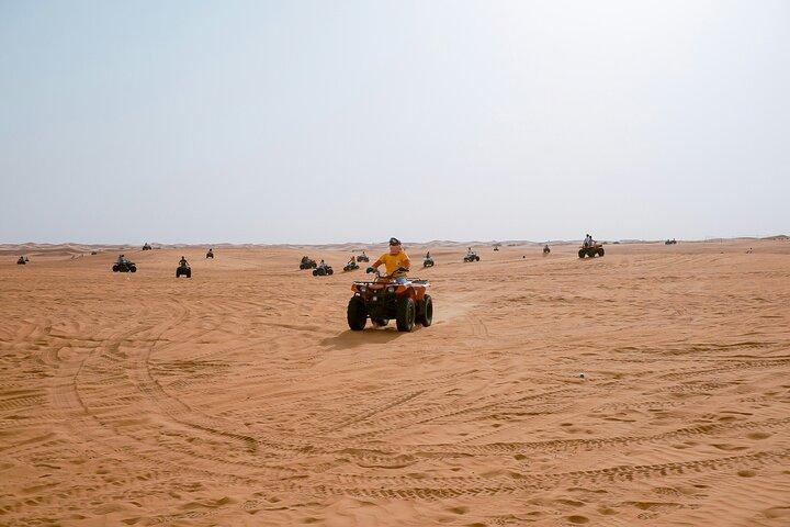 Dubai Desert Safari with Quad Bike, Sand Boarding & BBQ Dinner