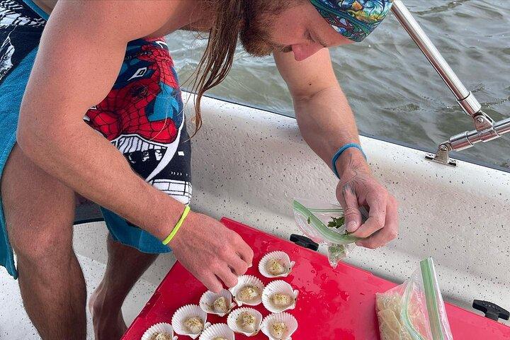 Privat halvdags scalloping Charter med kapten Paul och Lucas