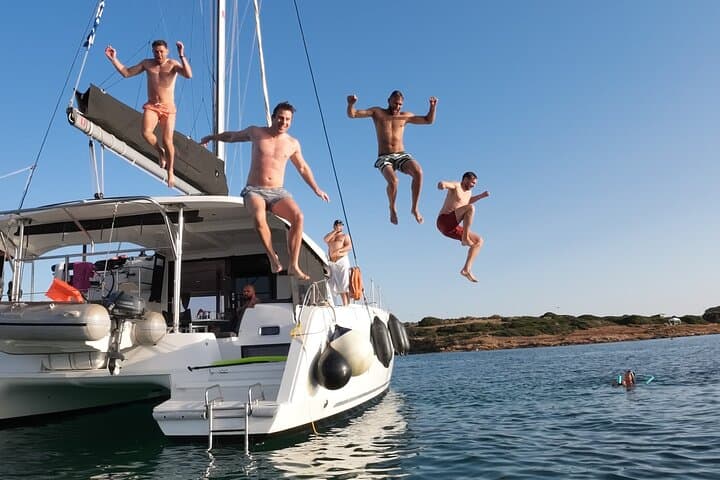 Sail the Athenian Coastline on a Catamaran with Meal & Wine