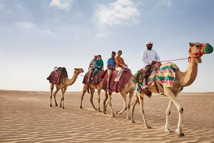 Dubai Evening Desert Safari: Sandboarding, BBQ, Camel Ride & more