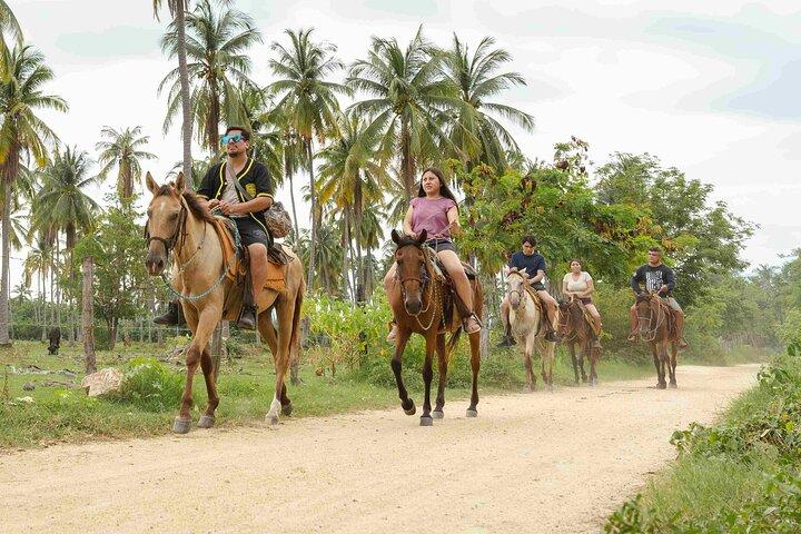 Passeio a cavalo na praia de Puerto Escondido