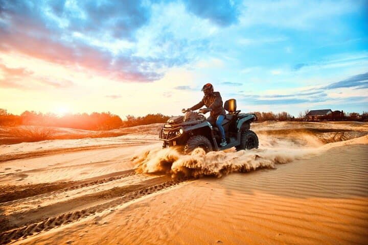 Premium Dubai Desert Safari with Quad Bike Camel Ride BBQ & Shows