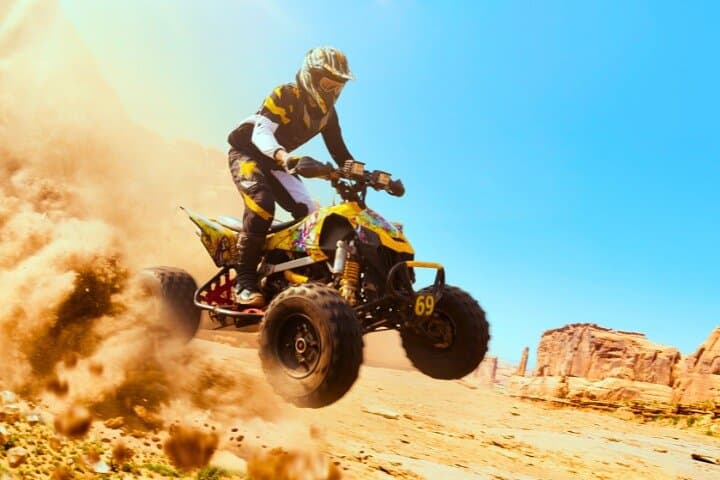 Premium Dubai Desert Safari with Quad Bike Camel Ride BBQ & Shows