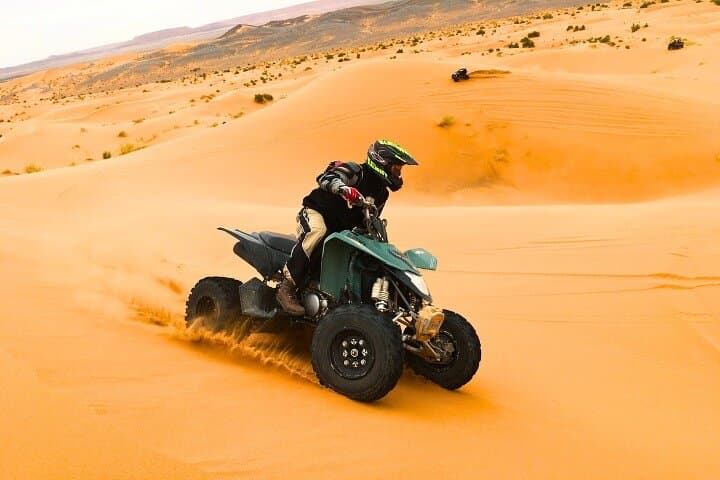 Premium Dubai Desert Safari with Quad Bike Camel Ride BBQ & Shows
