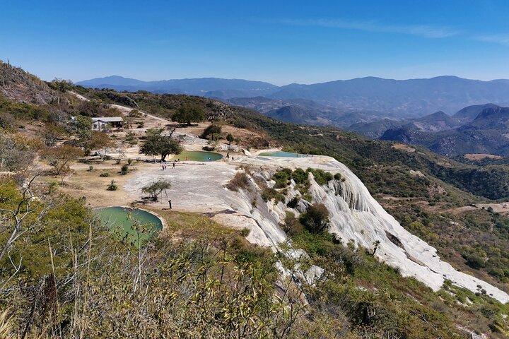 Enjoy Medio Día de Hierve el Agua and a mezcal factory.