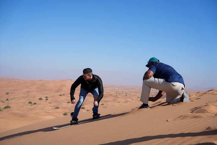 Premium Dubai Red Dunes Quad Bike Tour, Sandboard, Camel & BBQ