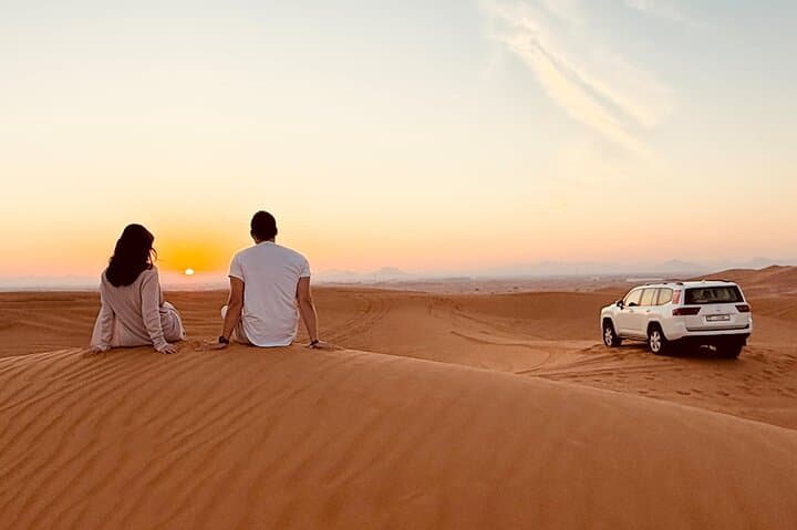 Dubai Sunrise or Sunset Desert Safari Camel Ride Falcon sandboard