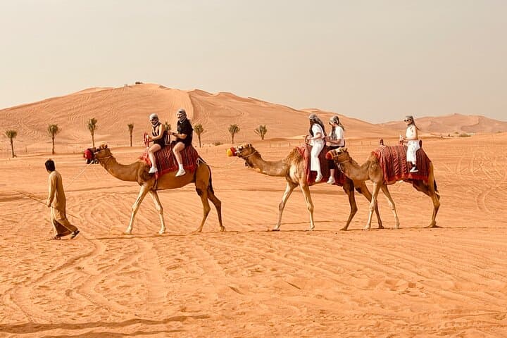 Dubai Sunrise or Sunset Desert Safari Camel Ride Falcon sandboard