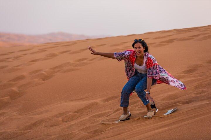 Dubai: Quad Bike Tour with Camel Ride, Sand Boarding & BBQ