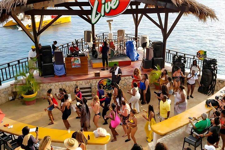 Negril Catamaran Sunset Cruise with Snorkeling, Drinks & DJ
