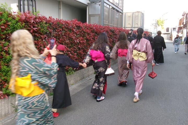 Learning Zen of Japanese Calligraphy in kimono near Osaka Castle