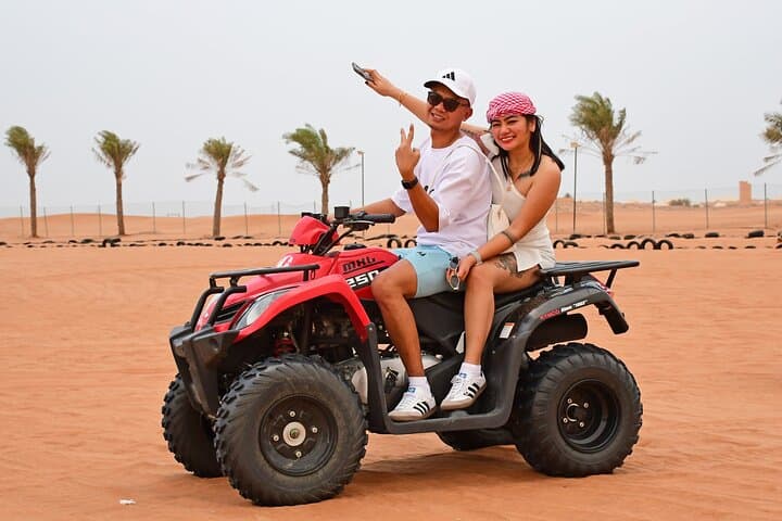 Desert Safari with Quad Bike, BBQ at Premium Camp & Camel Ride