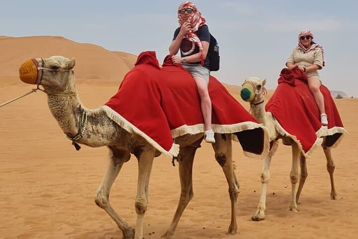 Desert Safari with Quad Bike, BBQ at Premium Camp & Camel Ride