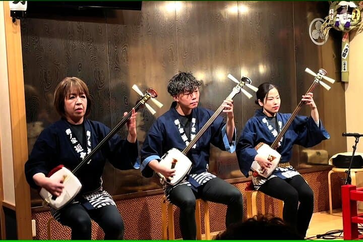 Tsugaru shamisen performance over traditional dinner