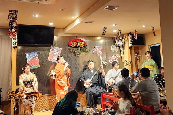 Tsugaru shamisen performance over traditional dinner