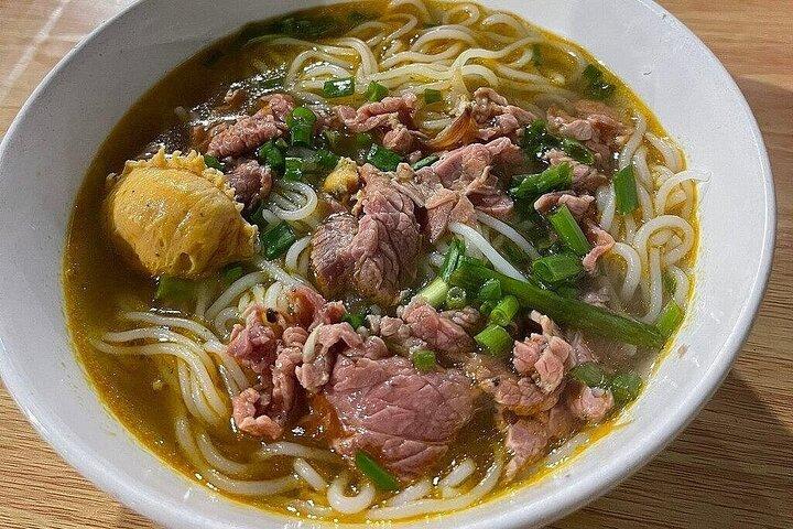 Hue by Night : Street Food Cyclo Tour