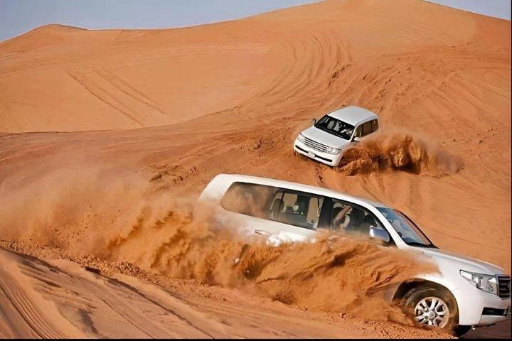 Red Dunes Sandboarding Quad Bikes and Camel Ride Adventure