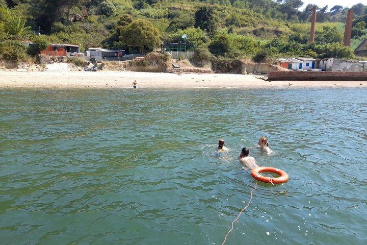 Lisbon Boat Cruise with Swimming Stop & Live Music