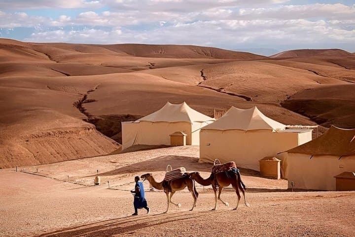 Agafay Desert Sunset Camel Ride Dinner and Cultural Show