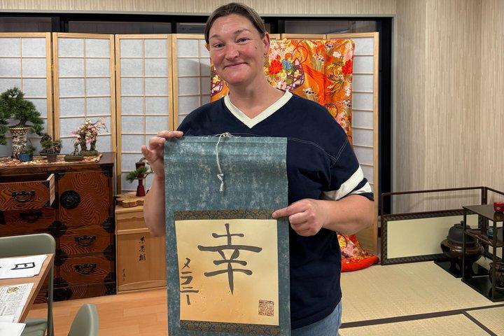 Art calligraphy pendurar rolos em Asakusa