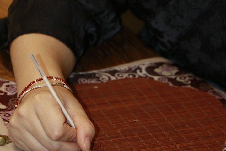 Chengdu Silk Fan Craft com intercâmbio cultural local