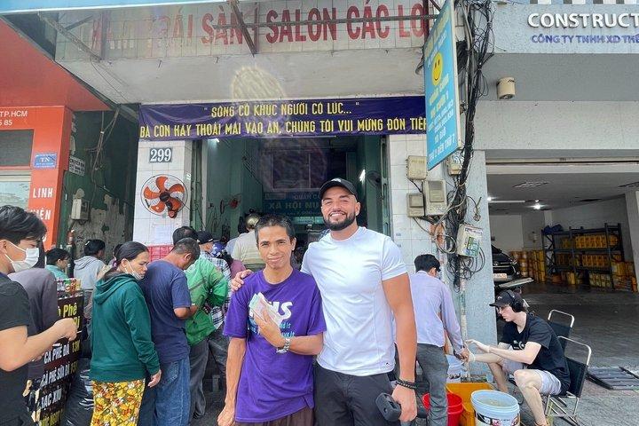 Zwei Seiten Saigons : Lokales Leben, Märkte & Slum Tour mit dem Roller