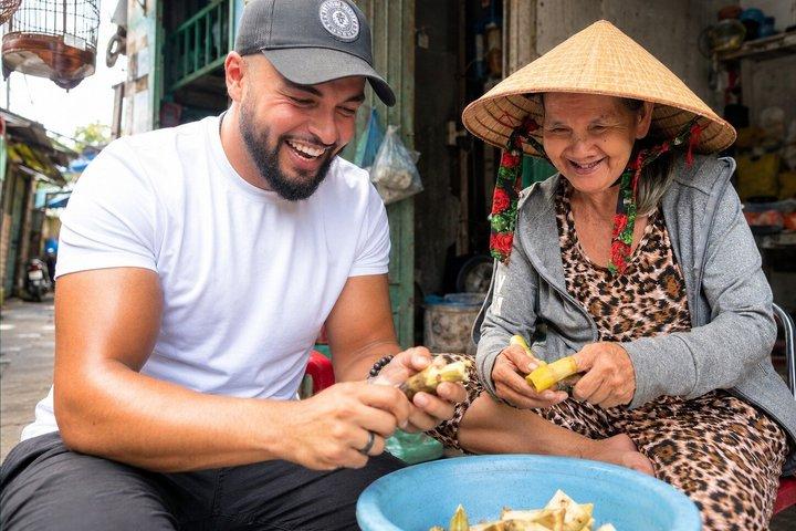 Zwei Seiten Saigons : Lokales Leben, Märkte & Slum Tour mit dem Roller