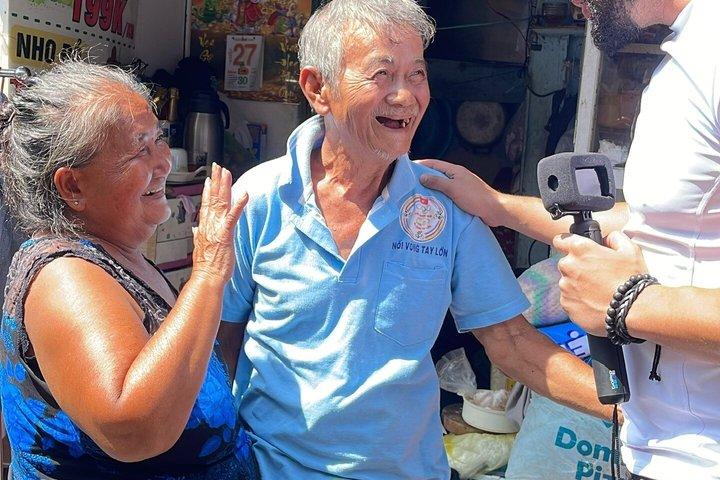 Zwei Seiten Saigons : Lokales Leben, Märkte & Slum Tour mit dem Roller